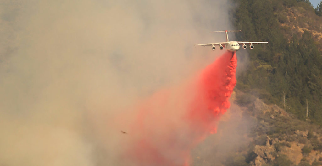 Air tankers are used to corral flames near Ledson Winery in Kenwood, Saturday Oct. 14, 2017. (Photo by Kent Porter)