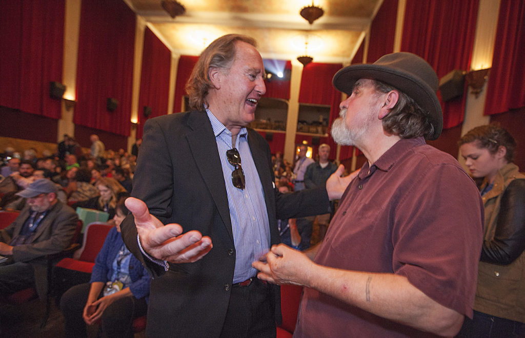 Kevin McNeely, executive director of SIFF, shares some thoughts with Roger Rhoten, of the Sebastiani Theatre, shortly before the opening program on Wednesday, 30 March, the opening night of the 19th Annual Sonoma International Film Festival. (Photos by Robbi Pengelly/Index-Tribune)