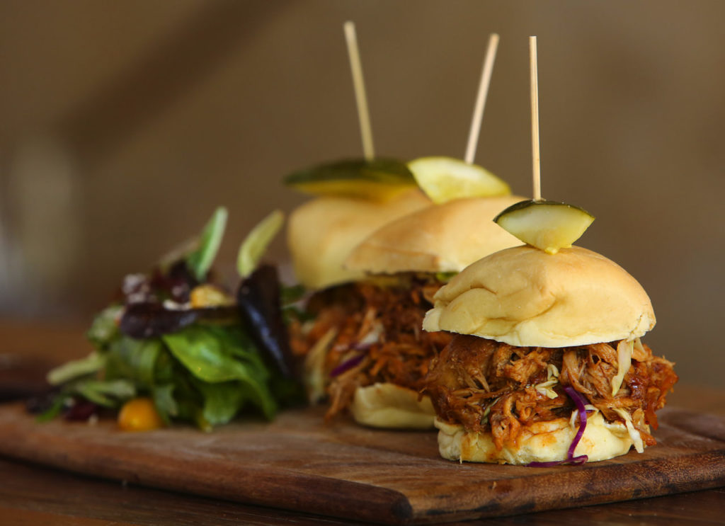 Pulled pork sliders with mango habenero sauce at the Belly Left Coast Kitchen & Tap Room in downtown Santa Rosa. (John Burgess/The Press Democrat)