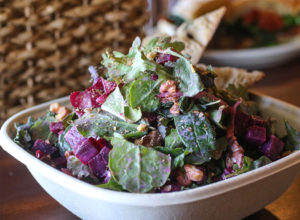 Beets and greens salad with walnuts, pickled onions, black pepper buttermilk dressing. Heather Irwin/PD