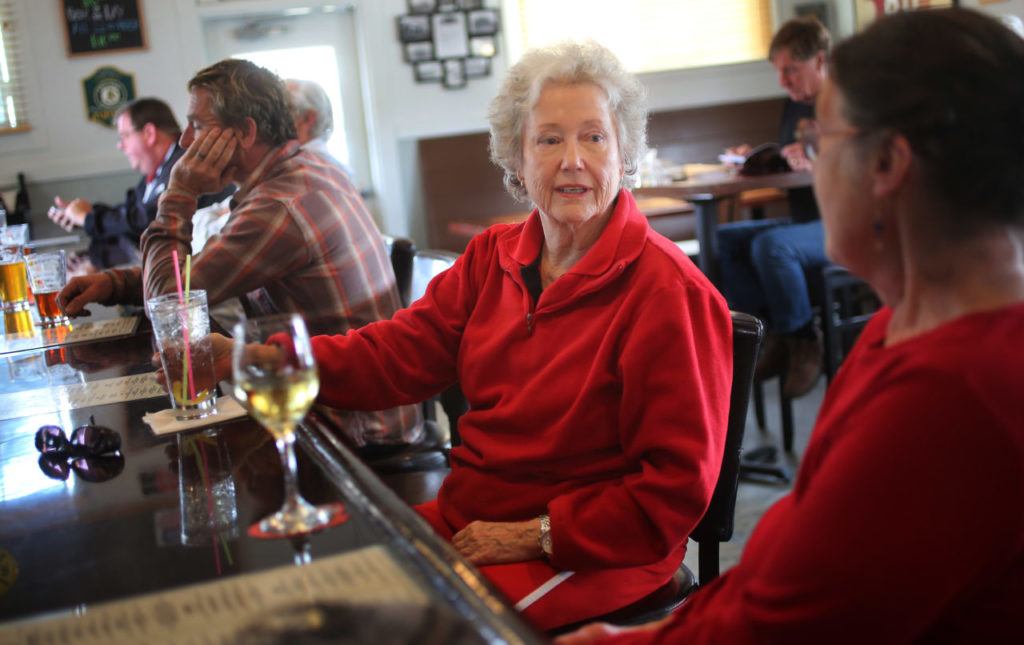 Susanne Imhaus, left and Carolyn Talvitie, right, both of Cloverdale enjoy a drink at Railroad Station Bar & Grill in Cloverdale, Tuesday, March 4, 2014. (Crista Jeremiason / The Press Democrat)