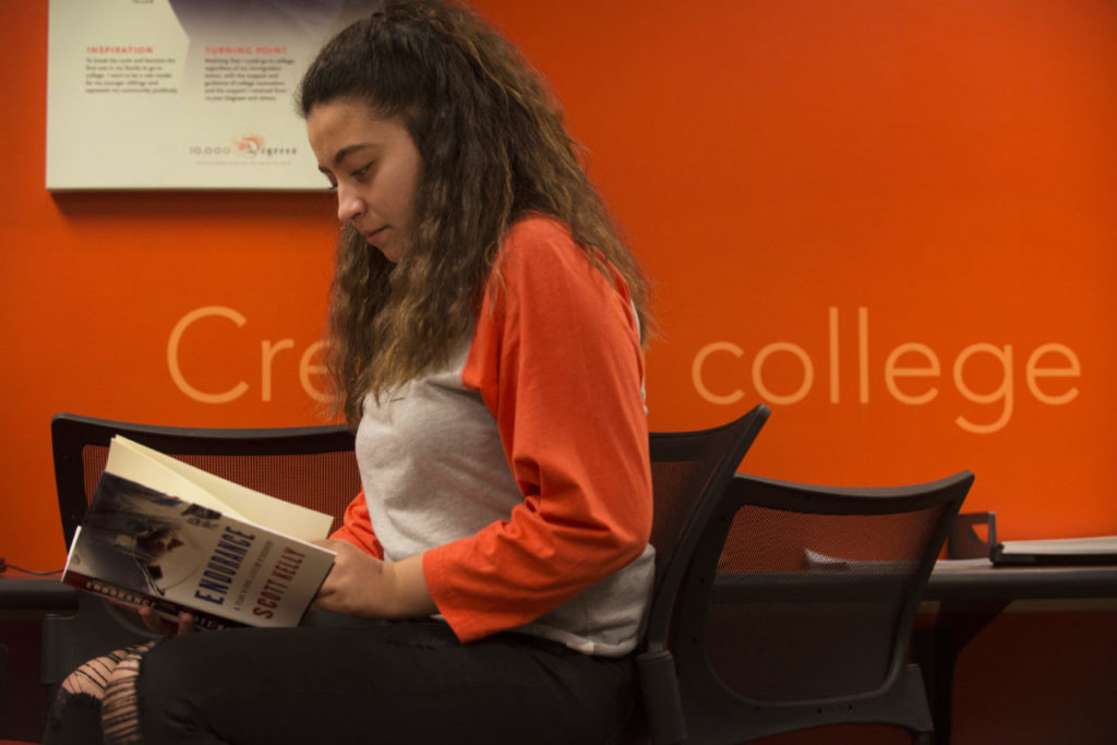 Sonoma Valley High School junior Kaishalee Baez, 17, browsing through astronaut Captain Scott Kelly's book "Endurance: A Year in Space, a Lifetime of Discovery" at the College Success Lab in the offices of 10,000 Degrees; an organization whose mission statement is to "help students from low-income backgrounds get to and through college in order to positively impact their communities and the world. The students in the program are being encouraged to attend the Sonoma Valley Authors Festival taking place on May 4-6 where author Kelly will be one of the speakers. January 24, 2018 (Photo: Erik Castro/for The Press Democrat)