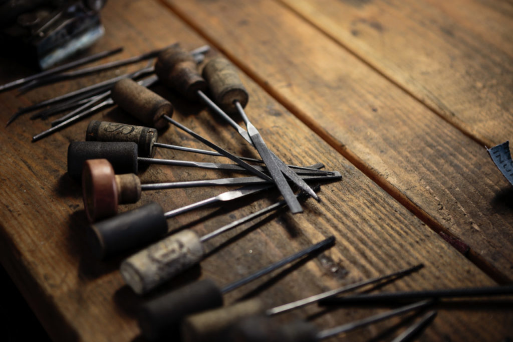 Tom Fitzgerald making a bike frame in his garage/workshop