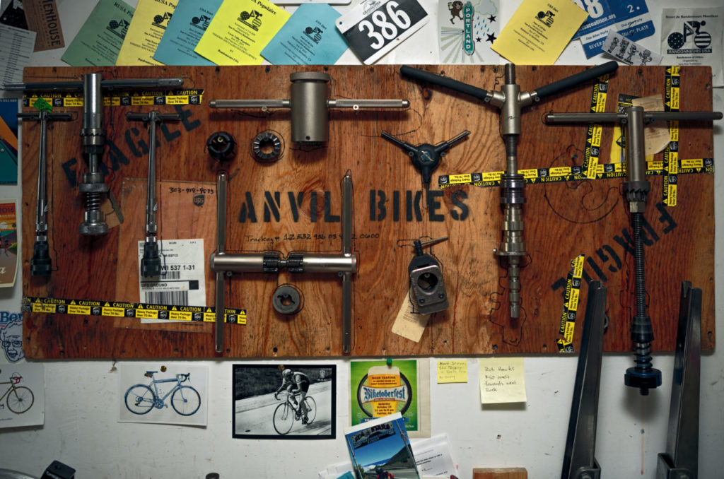Tom Fitzgerald making a bike frame in his garage/workshop