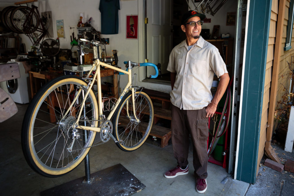 Tom Fitzgerald making a bike frame in his garage/workshop