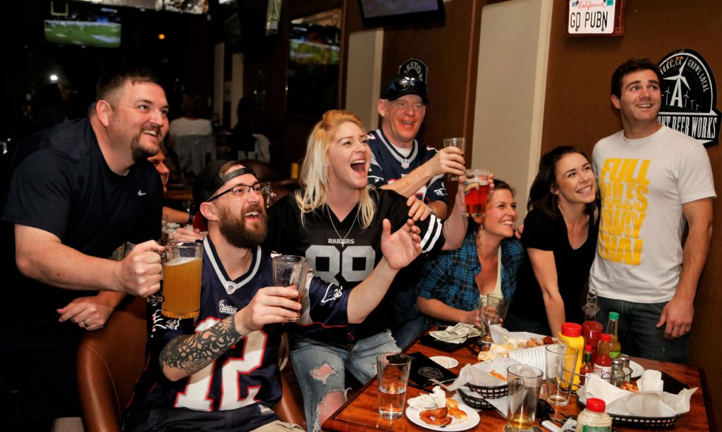 From left, Geoff Beck, David Finkelstein, Ruthie Van Esso, Kelly S, Gabrielle Russell, Brynn Keller and Jake Haas are glued to TV monitors at Sprenger's Tap Room in Santa Rosa during Sunday's exciting Superbowl match up, February 4th, 2018. (Photos Will Bucquoy/for the Press democrat)