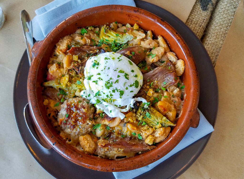 Cassoulet with Tarbais beans and artichokes, Toulouse sausage, duck confit, poached egg at Pearl restaurant in Petaluma Heather Irwin/PD