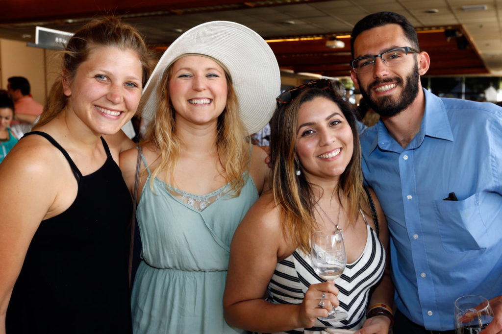 Jenna Topper, left, Marie Kneemeyer, Maria Ruiz and Dustin DeMatteo attend the North Coast Food and Wine Festival at SOMO Village in Rohnert Park, California, on Saturday, June 10, 2017. (Alvin Jornada / The Press Democrat)