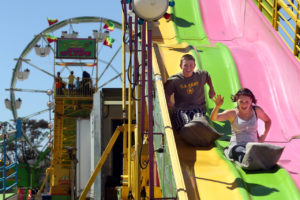 6/20/2013: B3: PC: Ben Jenkel, left, and Brittany Latorre ride the Super Slide at the Sonoma-Marin Fair, in Petaluma, on Wednesday, June 19, 2013. (Christopher Chung/ The Press Democrat)