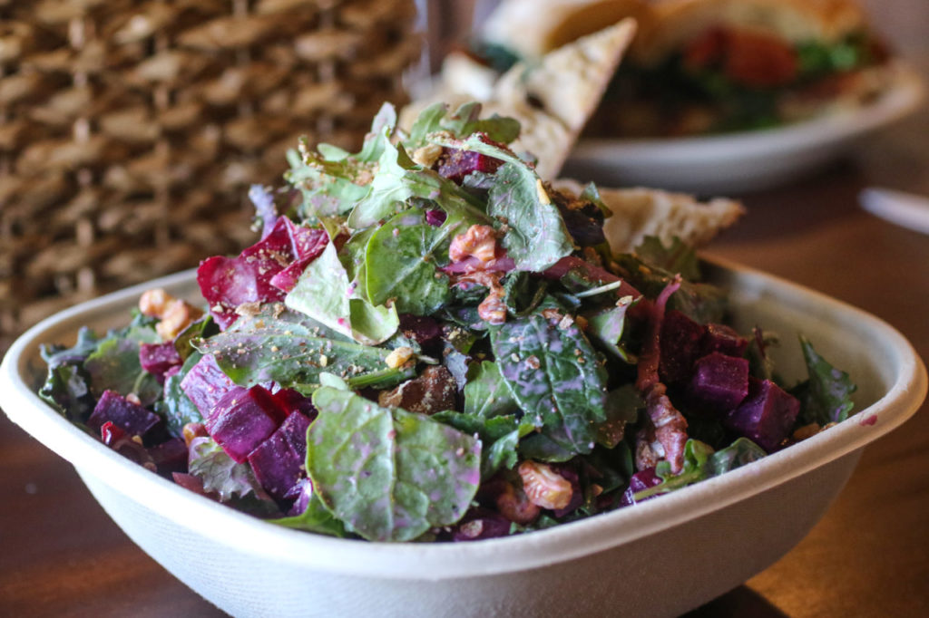 Beets and greens salad with walnuts, pickled onions, black pepper buttermilk dressing. (Heather Irwin)