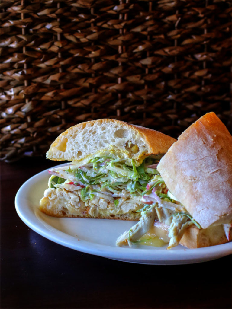 Roast chicken sandwich with apple Brussels sprout slaw, sharp cheddar, Dijon. (Heather Irwin)