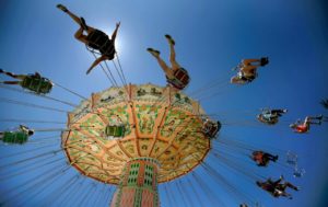 The Wave Swinger springs in to action during the opening day of the Sonoma County Fair, Friday July 24, 2015 in Santa Rosa. (Kent Porter / Press Democrat) 2015