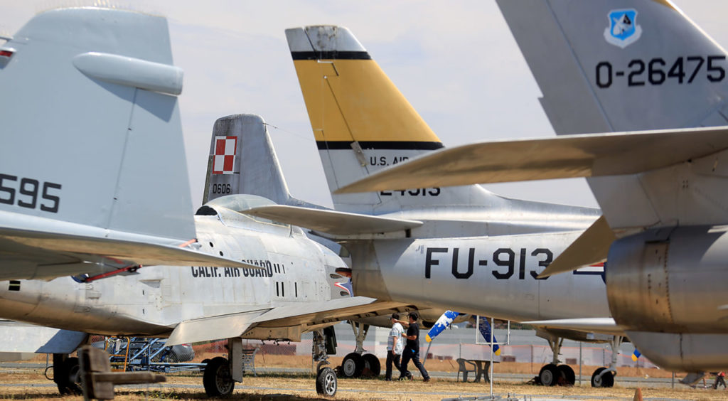 A crowd turns out for Hot Dog Thursday at the Pacific Coast Air Museum Thursday Aug. 6, 2015 at the Charles M. Schulz Sonoma County Airport in Santa Rosa. (Kent Porter / Press Democrat) 2015