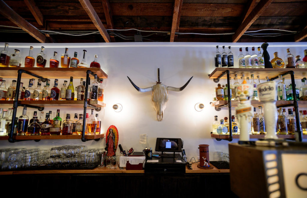 Crista Luedtke, owner of: Back bar are of El Barrio