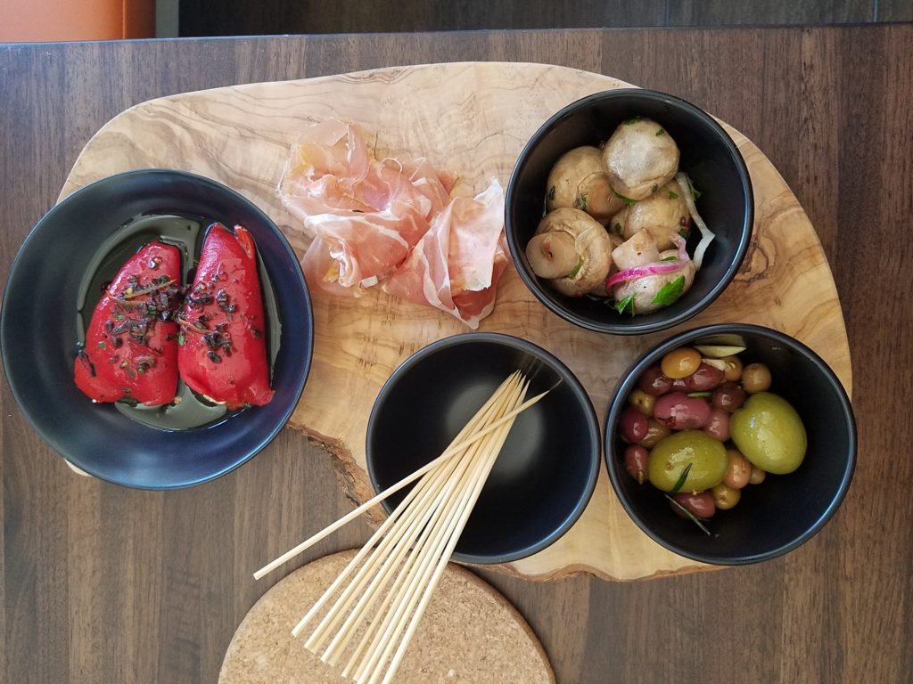 Tapas at Gerard’s Paella, Santa Rosa: Opening this Wednesday, June 27, popular paella maestro Gerard Nebesky’s first brick and mortar will serve up his signature rice dish along with Spanish tapas, sandwiches and salads. We got a sneak peek at some of the dishes, including the El Paquito bocadillo, a baguette-style sandwich with Serrano ham, Manchego cheese and arugula, and the El Pescador, a black paella with clams, mussels, prawns, sweet peas, peppers and aioli. Want to try the dish that beat celebrity chef Bobby Flay’s on the Food Network? The El Valdeon ($15) includes prawns, squid, mussels, marinated chicken, also known as the “Flay Slayer." Prices range from $5 to $15, 701 Fourth St., Santa Rosa, Open daily at 11a.m., 707-708-8686, gerardspaella.com. (Heather Irwin,PD)