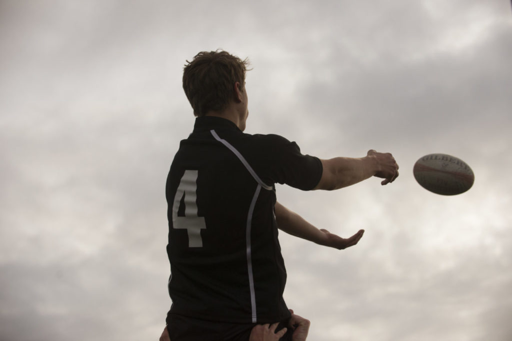 Petaluma High Junior Luke Haggard, 17, warming up before a Lobo Rugby Club game against Santa Rosa High held at Elsie Allen High School Friday evening. March 25, 2017. (Photo: Erik Castro/for The Press Democrat)