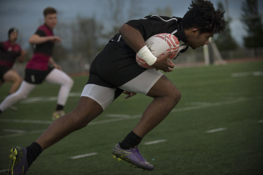Rancho Cotati High School Junior Epi Feoko, 16, during a Lobo Rugby Club game against Santa Rosa High held at Elsie Allen Friday evening. March 25, 2017. (Photo: Erik Castro/for The Press Democrat)