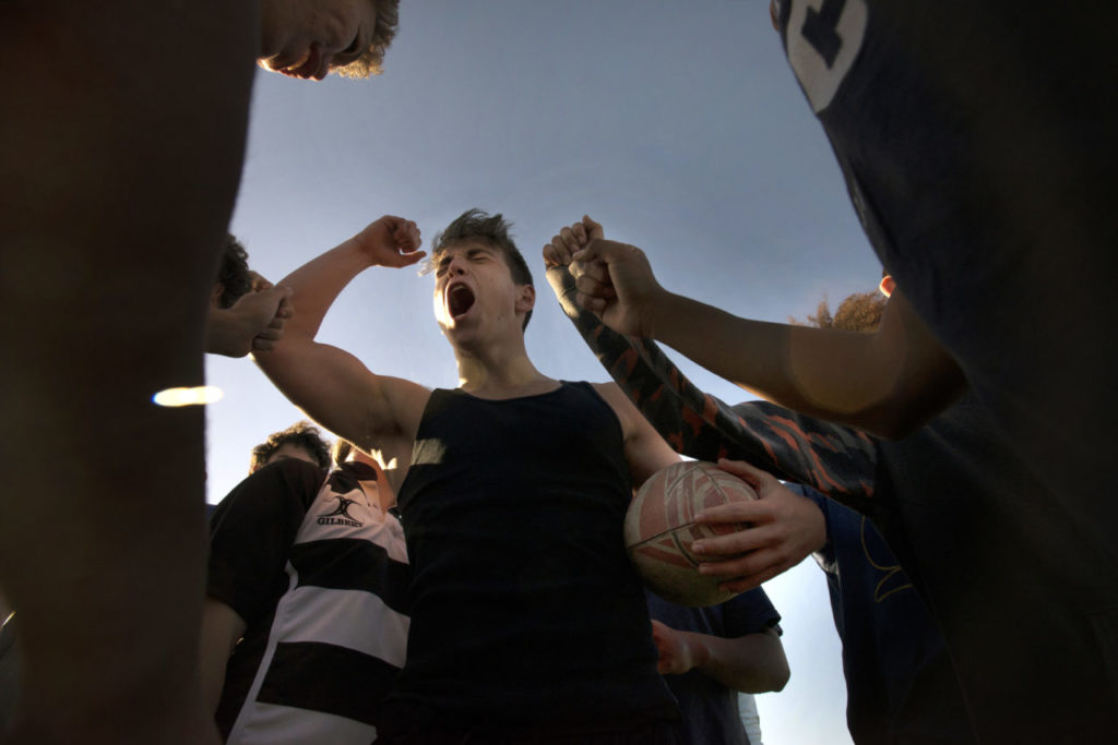 Maria Carrillo freshman Sergio Davis, 15, center doing the "Lobo" yell during Lobo Rugby Club practice at Elsie Allen High School in Santa Rosa, California. February 28, 2017. (Photo: Erik Castro/for The Press Democrat)
