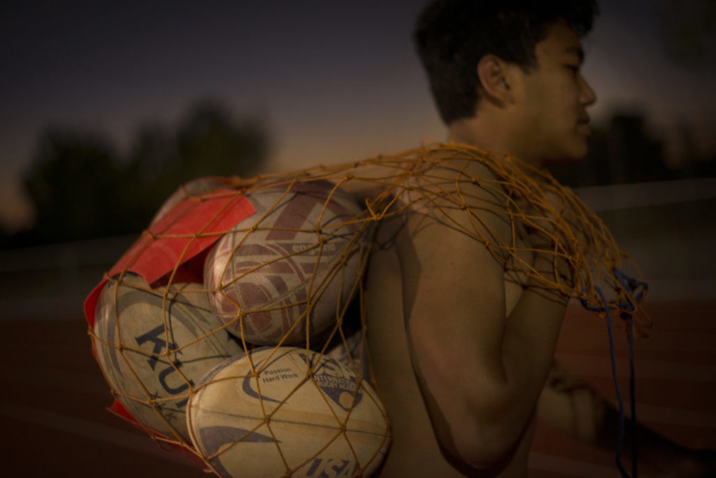 Lobo Rugby Club player David Klaut, 17, walking off the field with a sack full of rugby balls after a playoff game against Center Parkway Harlequins from Sacramento held at Elsie Allen High School in Santa Rosa. April 28, 2017. (Photo: Erik Castro/for The Press Democrat)