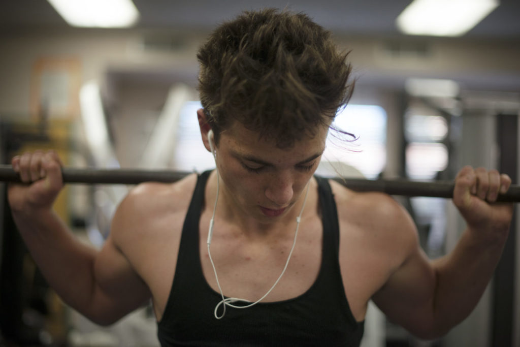 Maria Carrillo freshman Sergio Davis, 15, getting some weight training in after Lobo Rugby Club practice at Elsie Allen High School. Monday March 13, 2017. (Photo: Erik Castro/for The Press Democrat)