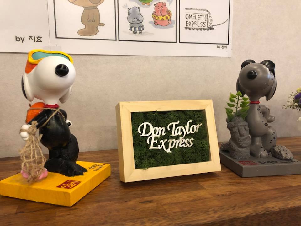 Snoopy figurines at the opening of Don Taylor Omelette Express in JeJu City on JeJu island in southern Korea. Santa Rosa restaurateur Don Taylor was on hand for the opening. Courtesy: Facebook