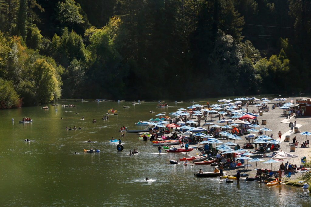 River-goers enjoy the sun and water at Johnson's Beach in Guerneville, California on Sunday, September 6, 2015. (Alvin Jornada / The Press Democrat)