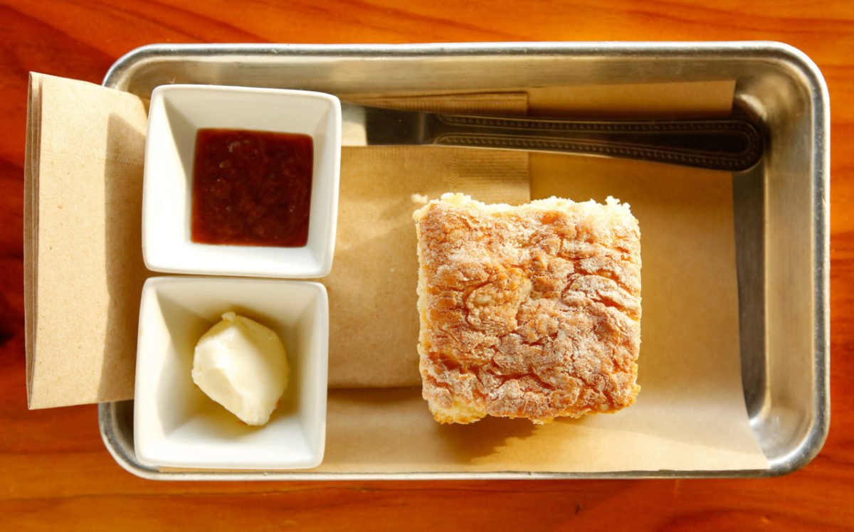 A Big Bottom biscuit with butter and jam at Big Bottom Market in Guerneville, California on Wednesday, October 26, 2016. (Alvin Jornada / The Press Democrat)