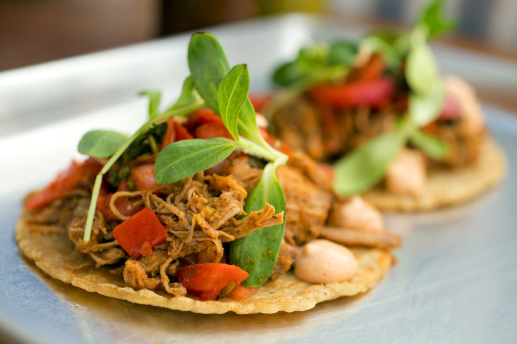 Dos Tacos with two yellow tortillas, your choice of meat, topped with chipotle aioli, pico de gallo, arugula and micro greens from Barrio Fresca Cocina Mexicana in Sebastopol's The Barlow. (Photo by John Burgess/The Press Democrat)