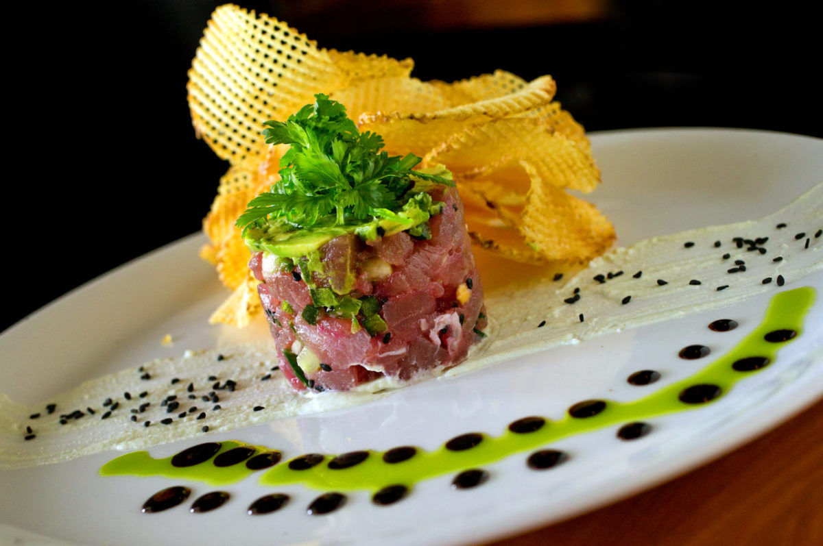 Ahi Tuna Poke with seaweed salad, cucumber, potato gaufrette, wasabi cream and shiso oil from the Salt & Stone in Kenwood. (John Burgess/The Press Democrat)