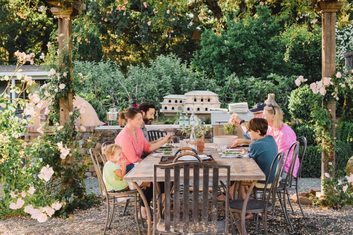 Rebecca Chotkowski The extended family dines outdoor at the farm.