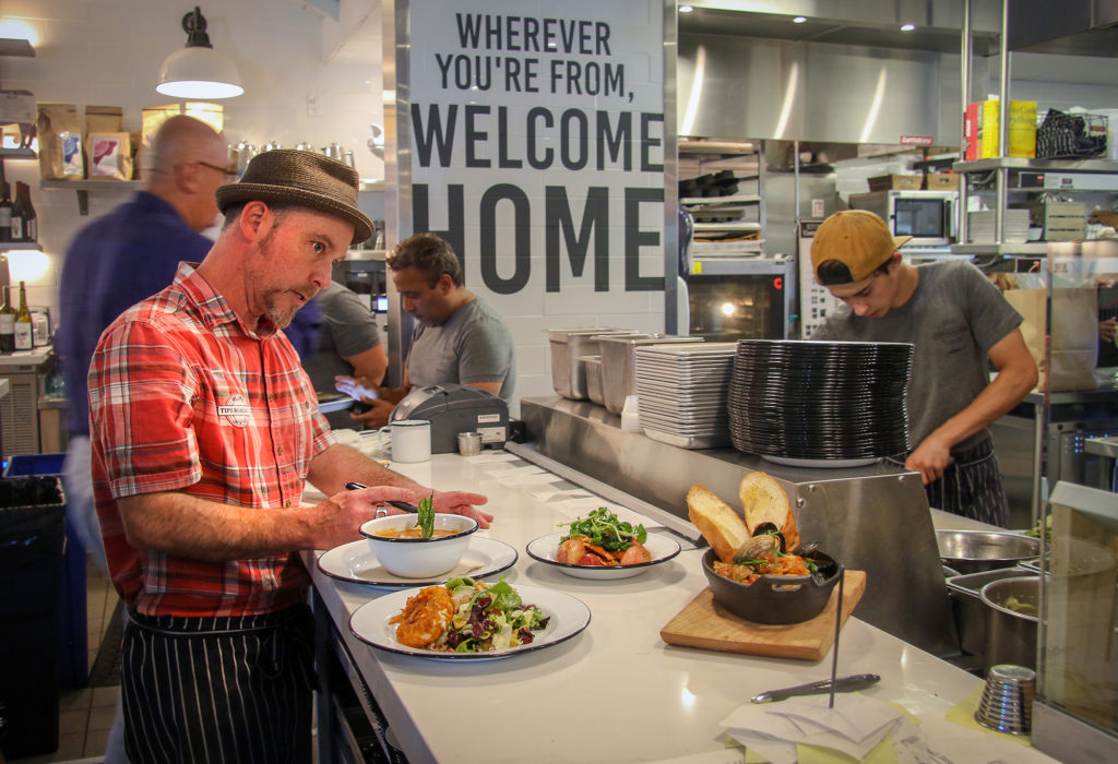 Chef Thaddeus Palmese expedites service at Tips Roadshouse in Kenwood. Heather Irwin, PD