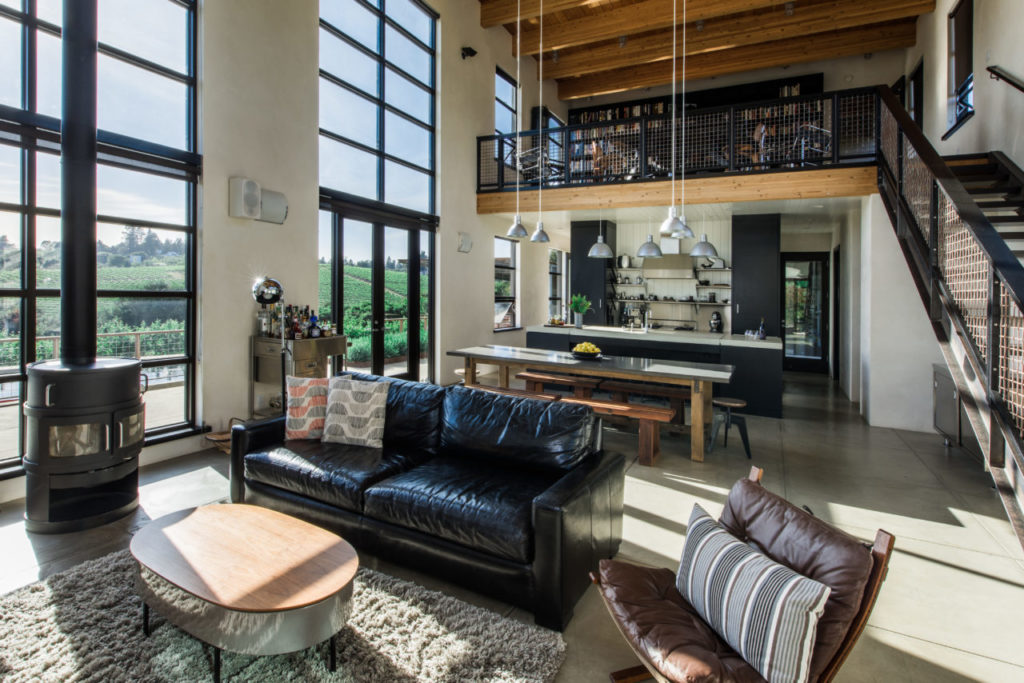 Main open concept living/ dining/ kitchen all with spectacular views towards the orchard.