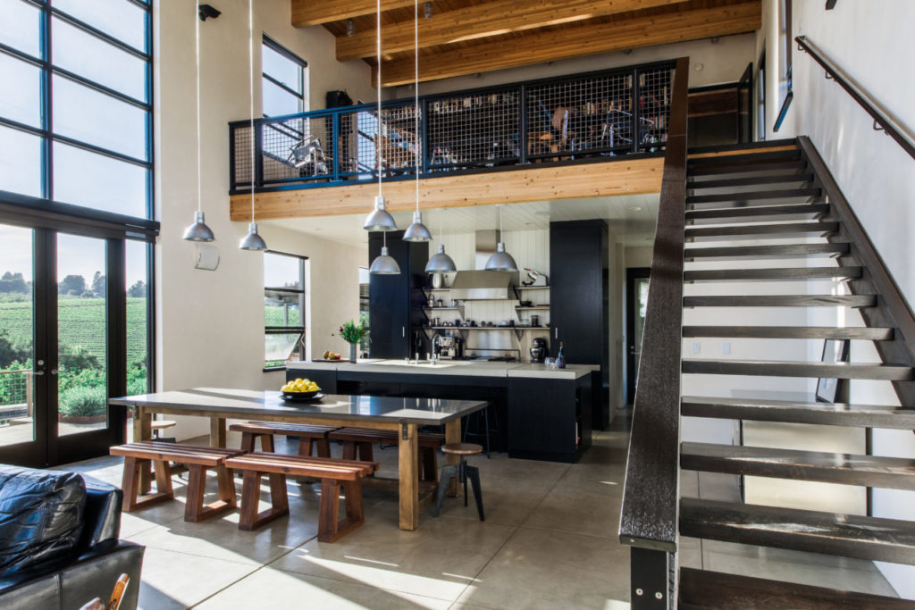 Steel beam staircase leading to the second level of the home.