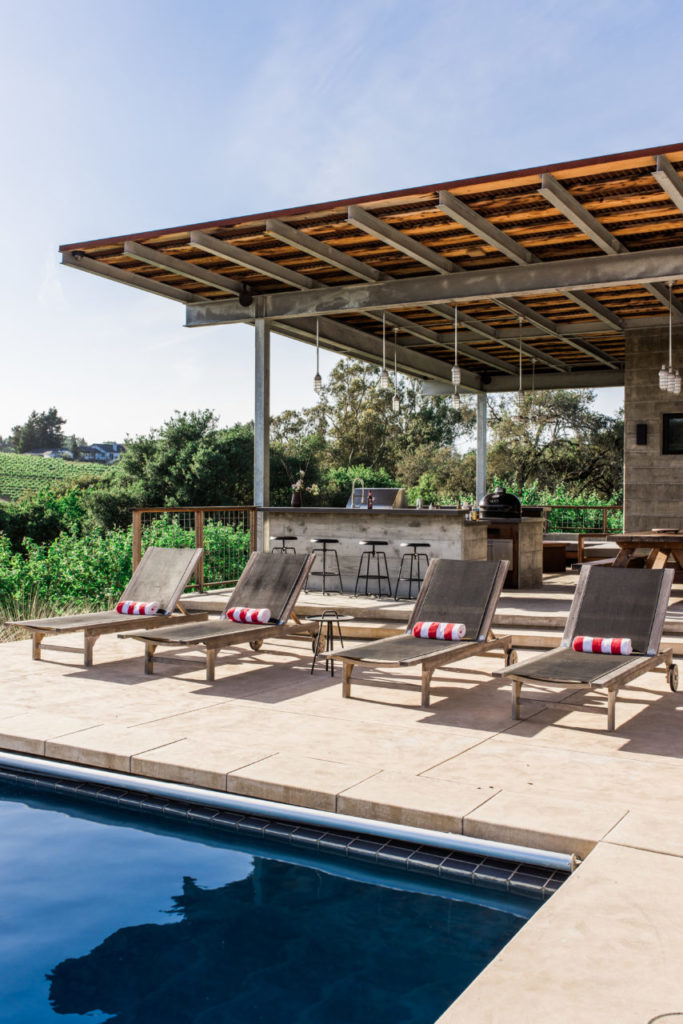 The family enjoys spending much of their time in the outdoor living space designed and executed by landscape architects Merge Studio Inc.