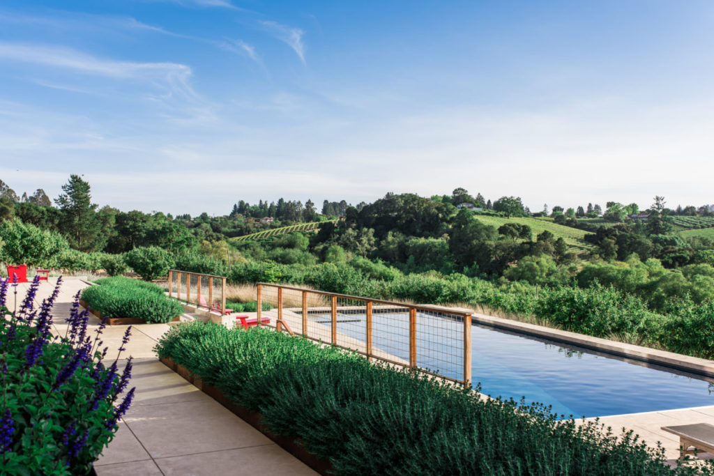 The family enjoys spending much of their time in the outdoor living space designed and executed by landscape architects Merge Studio Inc.