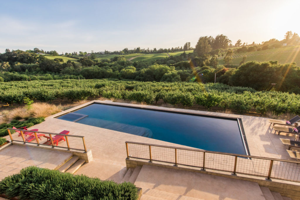 The family enjoys spending much of their time in the outdoor living space designed and executed by landscape architects Merge Studio Inc.