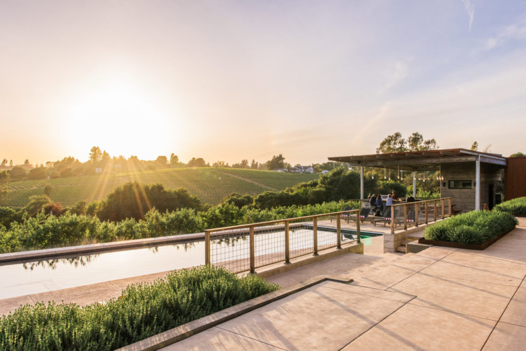The family enjoys spending much of their time in the outdoor living space designed and executed by landscape architects Merge Studio Inc.