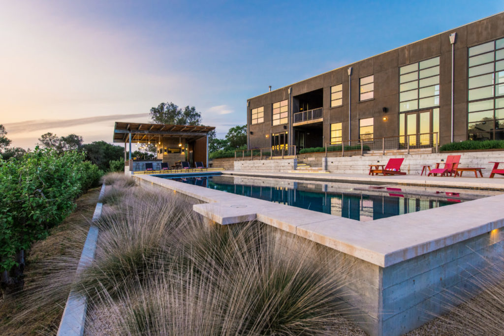 The family enjoys spending much of their time in the outdoor living space designed and executed by landscape architects Merge Studio Inc.