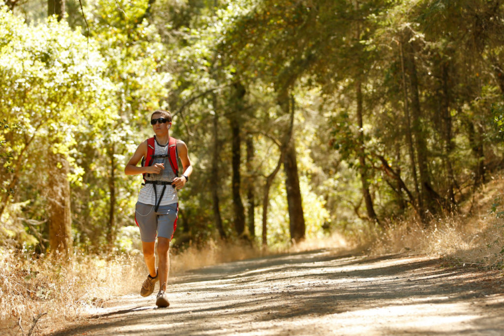 A trail runner who declined to give his name jogs down a path at Annadel State Park in Santa Rosa, California on Wednesday, July 20, 2016. (Alvin Jornada / The Press Democrat)