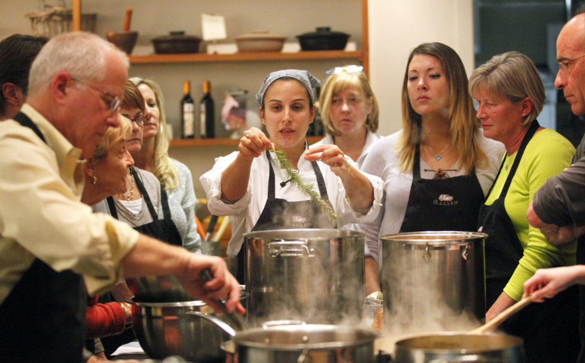Tracey Shepos, center, teaches a class called Perfect Winter Stocks and Soups at Relish Culinary Adventures in Healdsburg, Friday, January 11, 2013. (Crista Jeremiason / The Press Democrat)