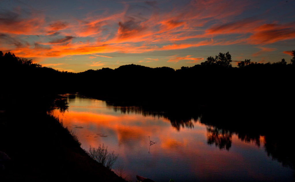 Sunset at the Front Porch Farm camp on the Russian River in Healsdburg during the LandPaths Russian River Teen Trek. (photo by John Burgess/The Press Democrat)