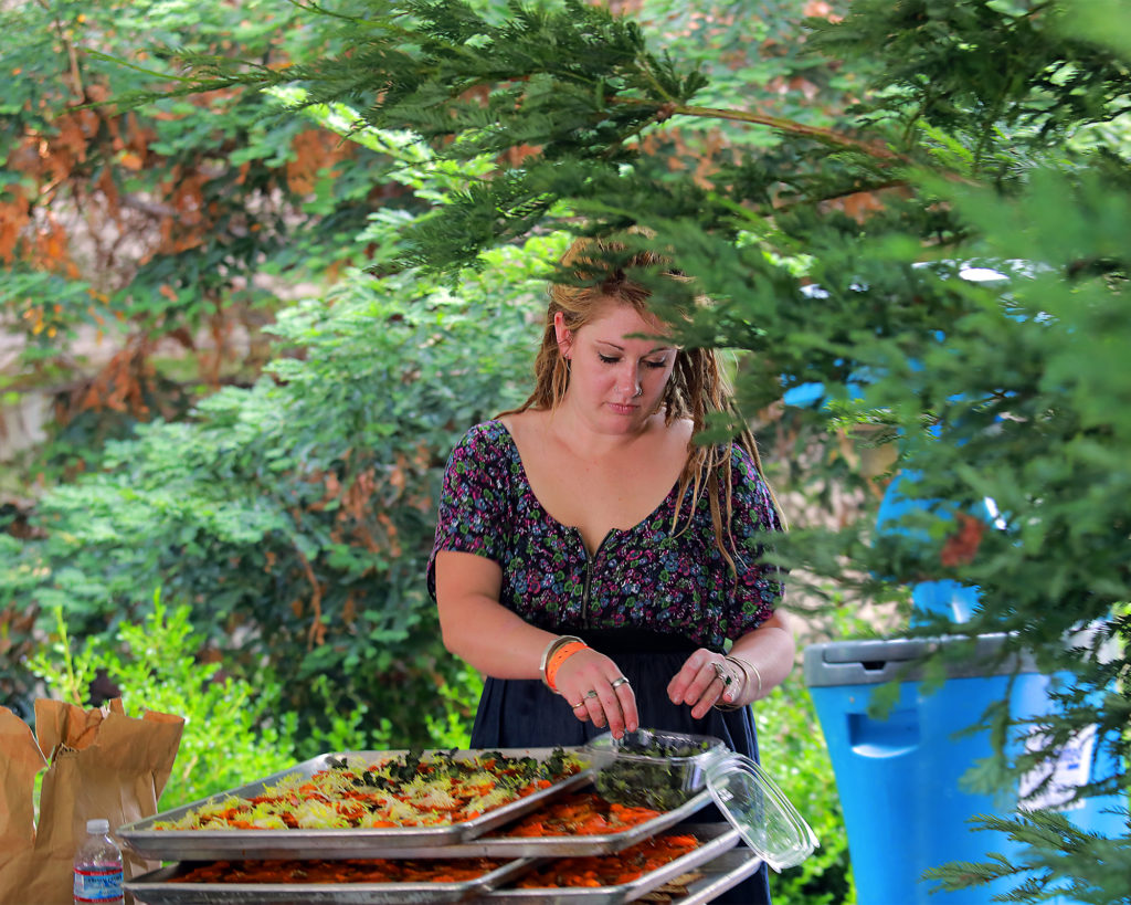 Kelli Bailey prepares carrot lox from the Drawing Board at the Taste of Sonoma at the Green Music Center on the SSU campus on Saturday, September 2, 2107. (photo by John Burgess/The Press Democrat)