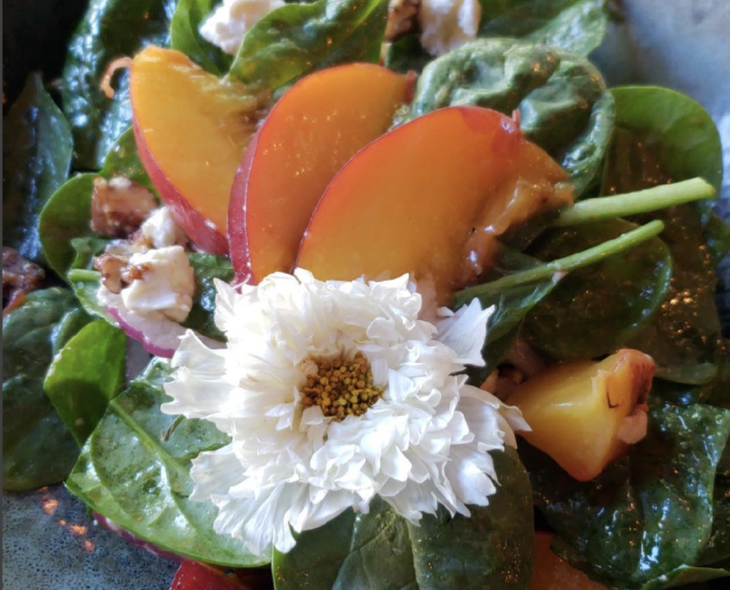 Peach and goat cheese salad at Barrels Brews and Bites in Healdsburg. Courtesy photo