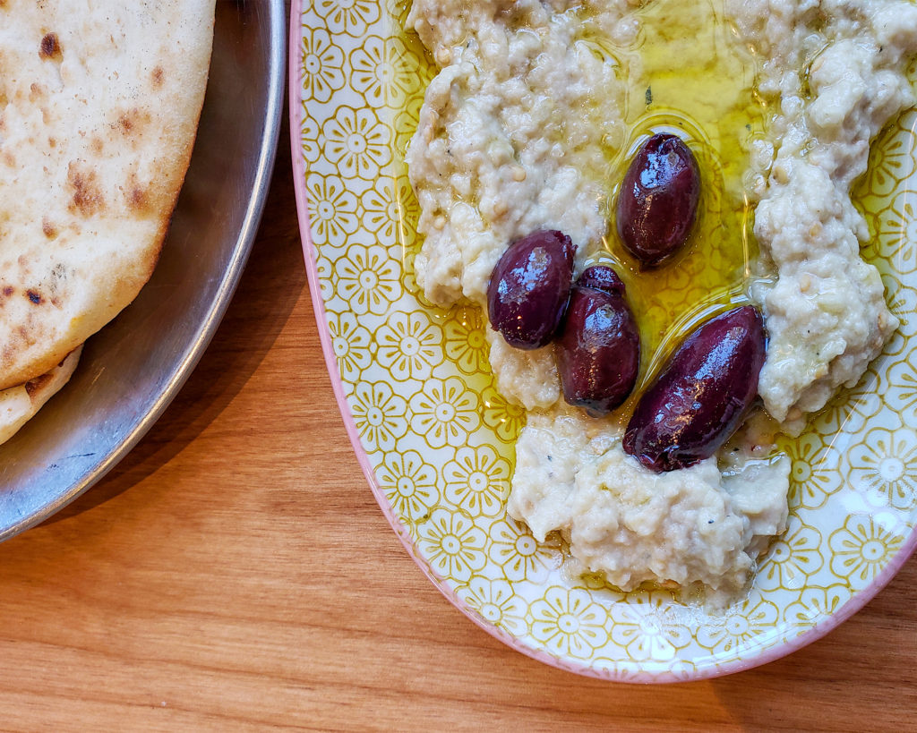 Roasted eggplant dip with pita bread at Stockhome Restaurant in Petaluma. heather irwin/PD