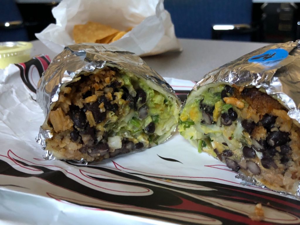 Oliver's Market, multiple locations: The only (local) burrito we could find that offered vegan chorizo. The mini sizing option is also a bonus. We got ours with black beans, Mexican rice, guacamole, cilantro, lettuce, onions, cheese, jalapeños and vegan chorizo. 