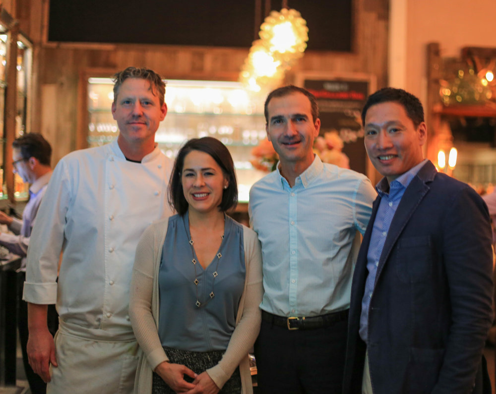 Ryan Fancher, left, with Barndiva staff.