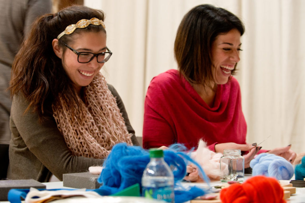 Andrea Salas, left, and her mother Goretti Hamlin laugh with each other during the needle felting class at Cast Away Folk in Santa Rosa, Calif., on January 16, 2014. (Alvin Jornada / The Press Democrat)
