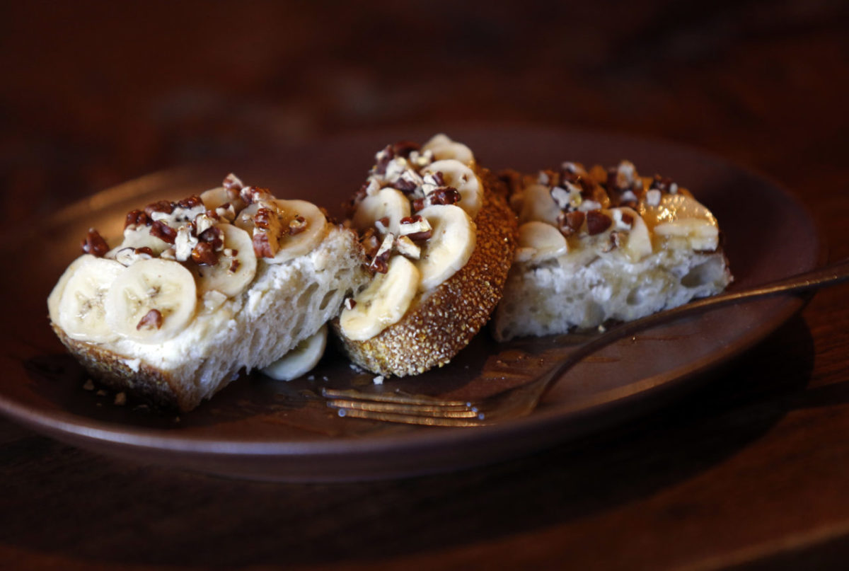 Della Breakfast Toast with ricotta cheese, banana slices, toasted pecans, honey and salt at Della Fattoria in Petaluma. (Beth Schlanker/The Press Democrat)