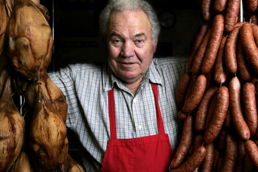 1/25/2006: D1: Angelo Ibleto of Angelo's Meats makes not only smoked meats but specialty sausages and jerky, as well as mustards, sauces and spices at his Adobe Road store in Petaluma. Ibleto, 72, grew up in Liguria, in Northern Italy, and now has one of the few mom-and-pop butcher shops left in Sonoma County. PC: 1 of 4 -- LEDE 01/13/06 -- Angelo Ibleto of Angelo's Meats, not only makes smoked meats but makes specialty sausages, jerky's as well as mustards, sauces and spices at his Adobe Road store in Petaluma. (The Press Democrat / Crista Jeremiason)