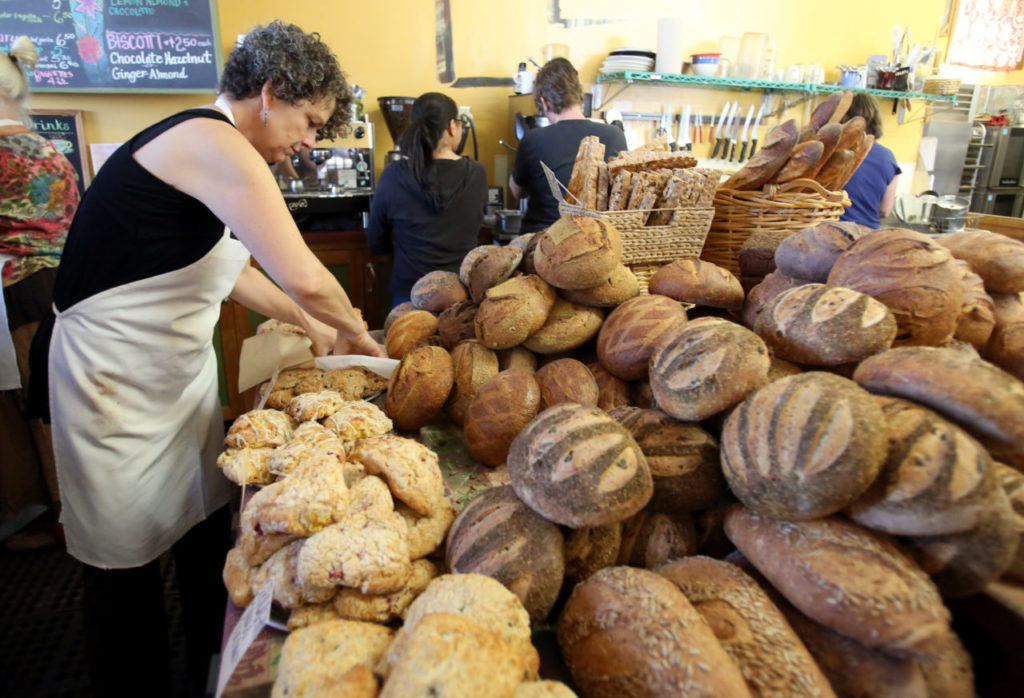 Krikit Morris, bags some scones at Wild Flour Bread in Freestone, July 28, 2012.
